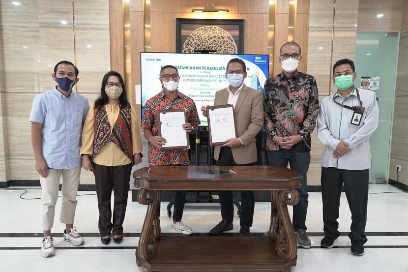 penandatanganan Perjanjian Kerja Sama (PKS) antara  PT Pegadaian (Persero) dengan PT Investree Radhika Jaya di Jakarta, Kamis (6/5/2021).