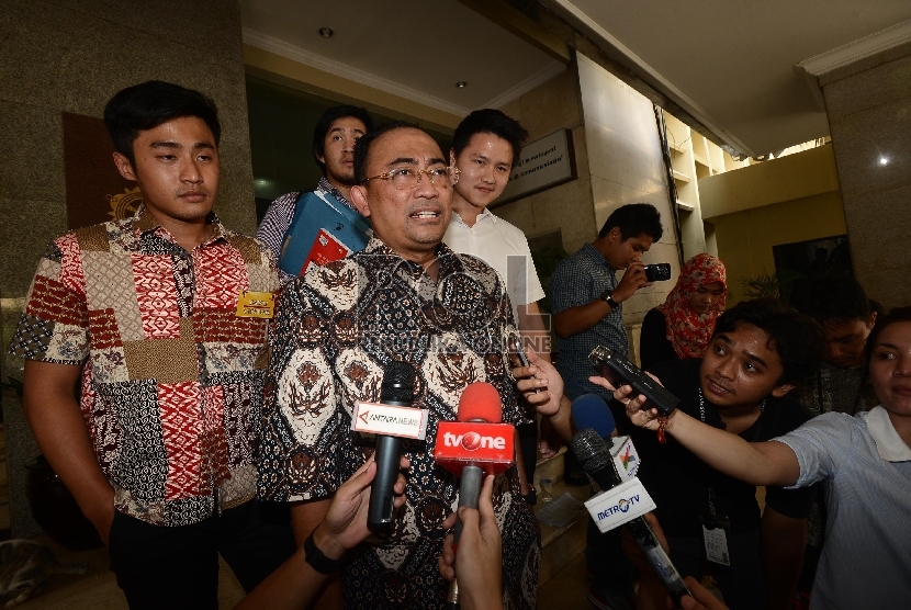 The non-active House of Representatives speaker Setya Novanto's lawyer, Firman Wijaya (second, right).
