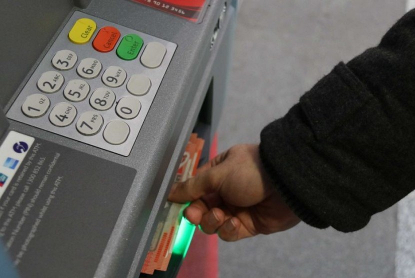 Penggunaan ATM di Australia bulan Desember tahun lalu turun tujuh persen.