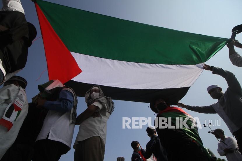 Bendera Palestina. Komite III Majelis Umum PBB memberikan dukungannya bagi pemenuhan hak rakyat Palestina untuk menentukan nasibnya sendiri.