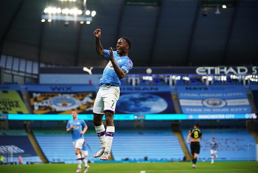 Penyerang Manchester City Raheem Sterling merayakan golnya ke gawang Arsenal