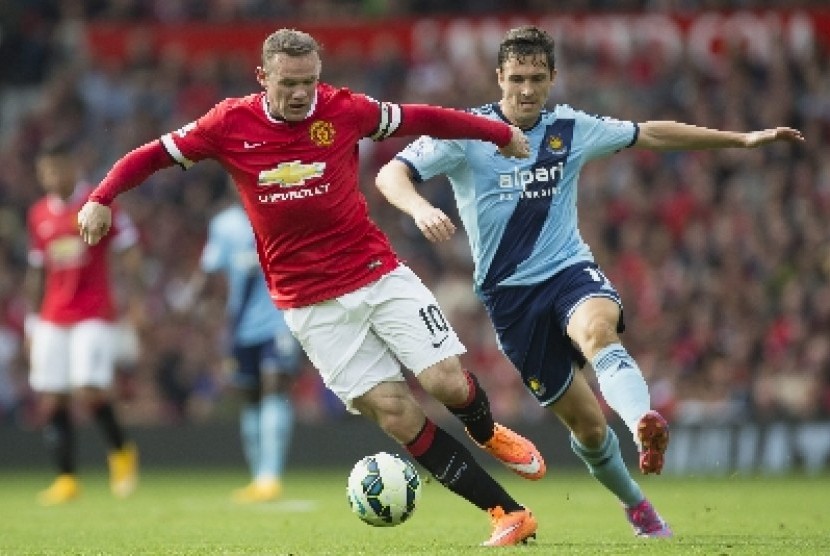 Penyerang MU, Wayne Rooney.