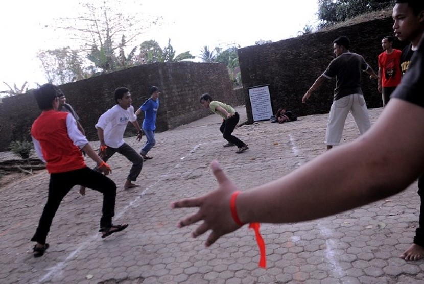 People play traditional game called 