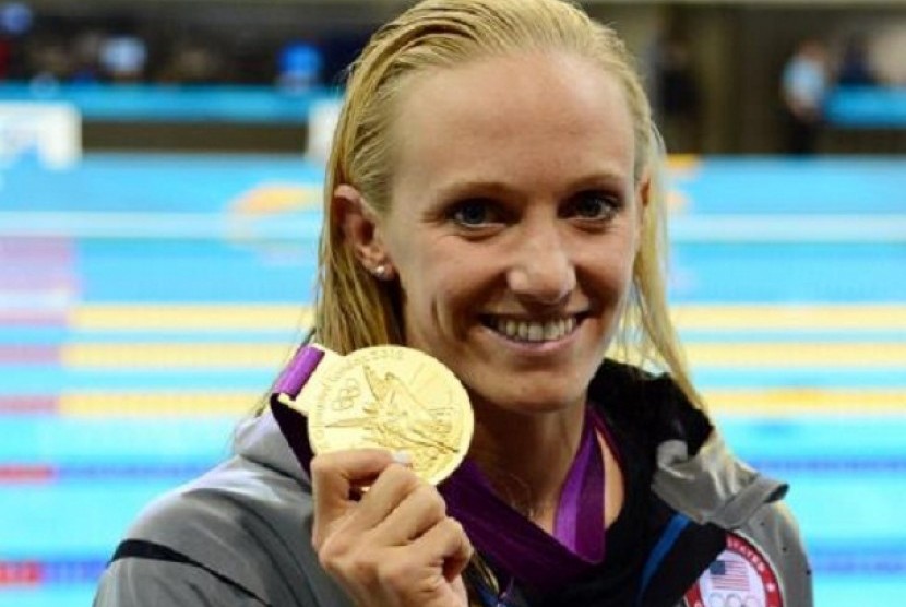 Perenang Amerika Serikat, Dana Vollmer meraih medali emas di cabang renang putri nomor 100 meter gaya kupu-kupu di Olimpiade London 2012.