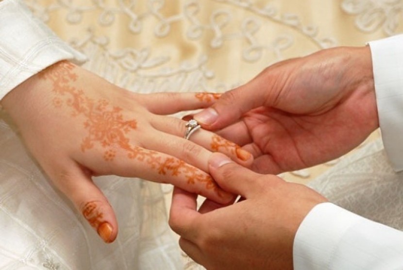 Pernikahan yang dilakukan secara Islam.