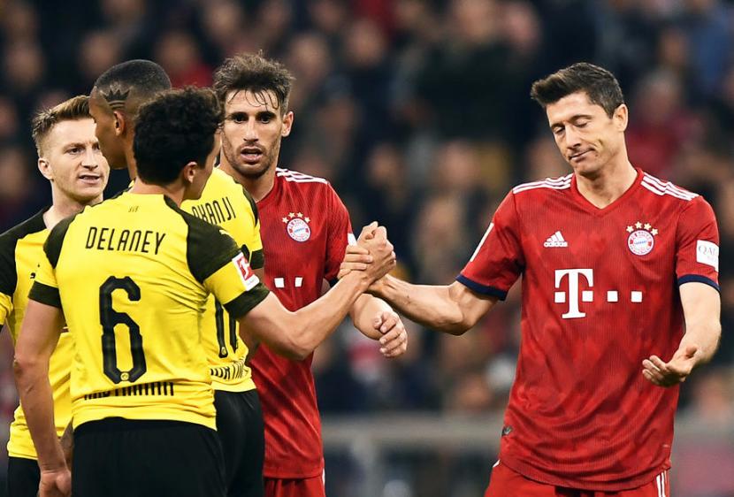 Pertandingan Bayern Munchen vs Borussia Dortmund tersaji pada laga pekan ke-28 Bundesliga Jerman, Selasa (26/5).