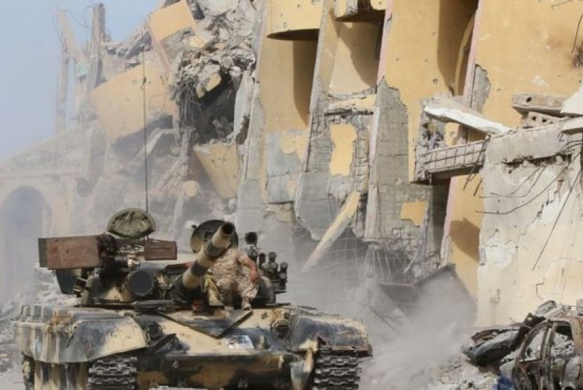 Pertempuran yang terjadi di pangkalan udara Brak El Shati, Libya, Jumat (19/5).