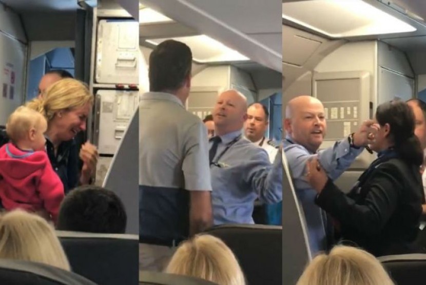 Pertengkaran di dalam pesawat American Airlines yang melibatkan awak pesawat, beberapa penumpang dan seorang perempuan yang sedang menggendong anak. 