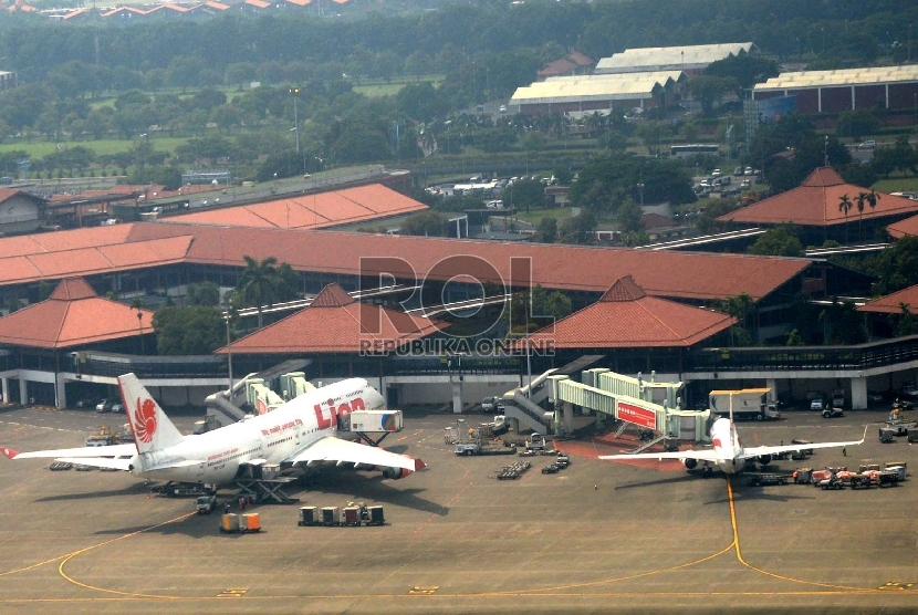 Pesawat udara terpakir di Bandara Soekarno Hatta, Tangerang, Banten, Kamis (19/3).