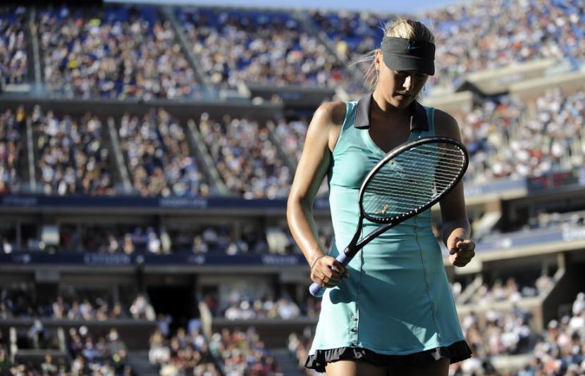 Petenis Maria Sharapova saat beraksi pada Grand Slam US Open yang digelar oleh Asosiasi Tenis Amerika Serikat (USTA).