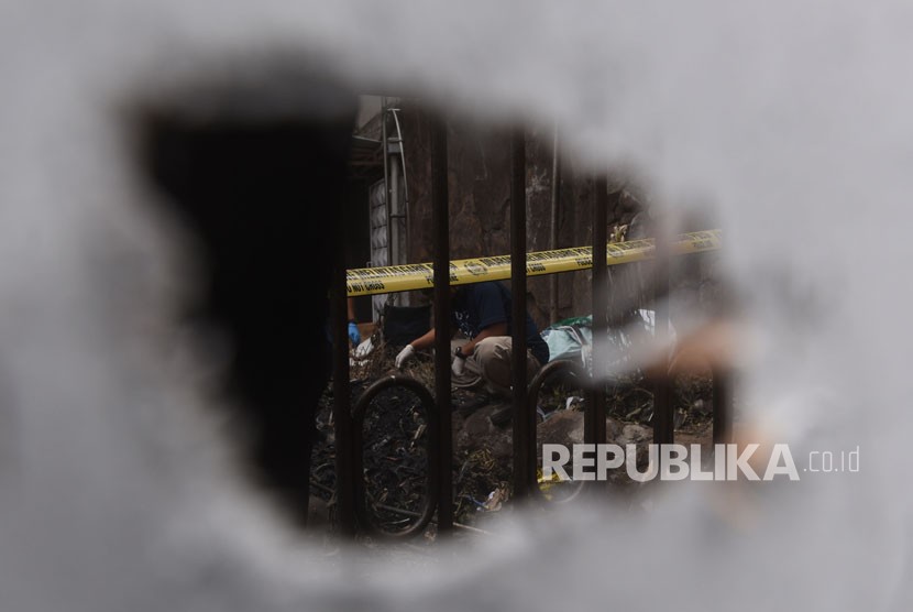 Police conducted crime scene investigation following a suicide bomb attack at Pentecostal Church at Arjuno Street, Surabaya, East Java, on Thursday (May 17).
