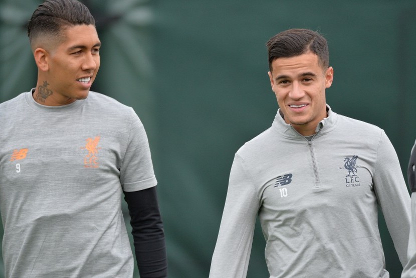 Philippe Coutinho dan Roberto Firmino.