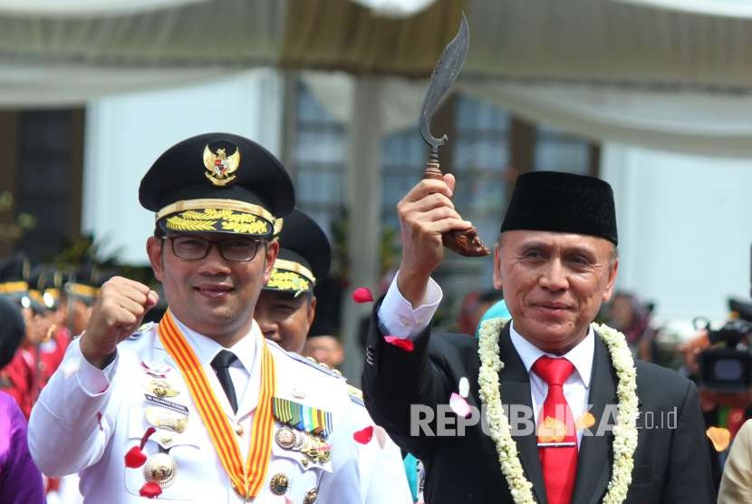 Gubernur Jawa Barat Ridwan Kamil (kiri) bersama M Iriawan. KNPI Jabar mendorong Ridwan Kamil maju jadi capres dan Iwan Bule jadi cagub Jabar.