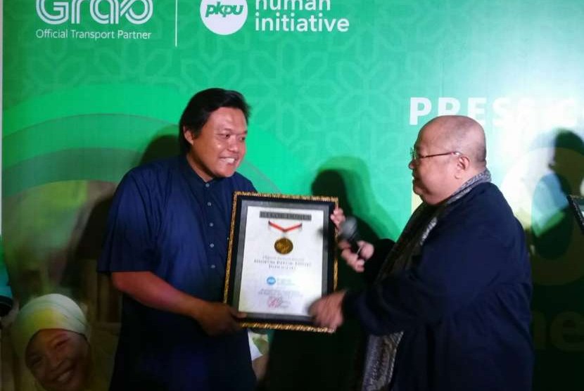 PKPU Human Initiative (PKPU HI) bekerja sama dengan Grab Indonesia membagikan 5.000 bingkisan daging kurban.