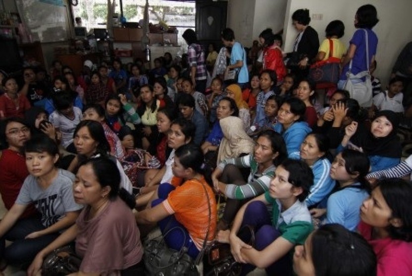 Police rescue at least 161 women from a house in Bekasi, West Java before they are sent abroad as illegal workers.