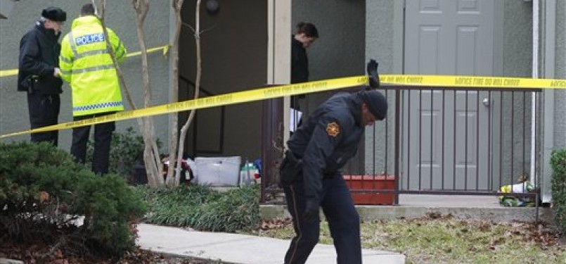  Polisi Grapevine melakukan investigasi kasus tujuh korban tewas di sebuah apartemen di Grapevine, Texas, Ahad (25/12). 