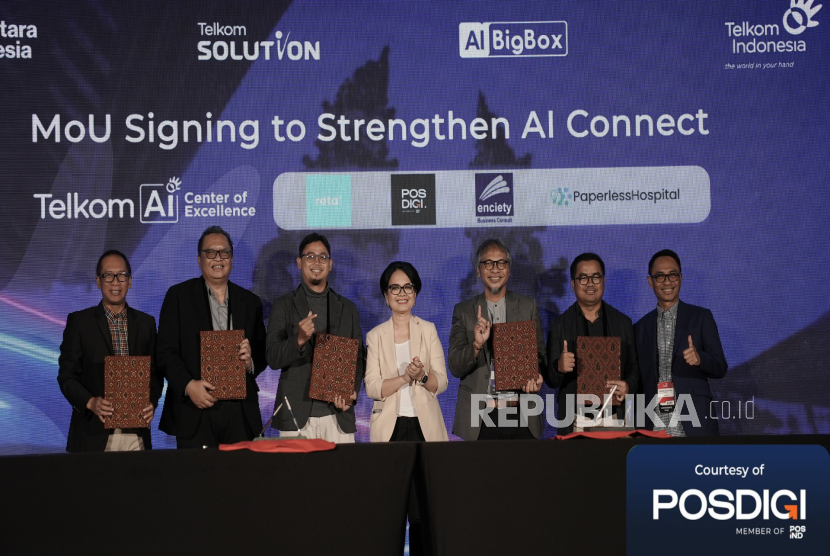 POSDIGI bersama Telkom menandatangani nota kesepahaman pengembangan AI untuk digitalisasi sistem logistik.