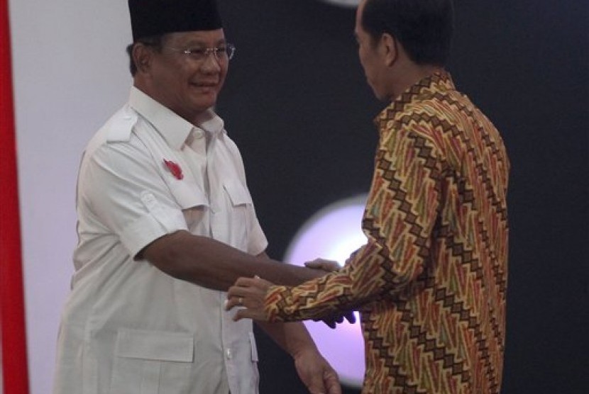 Presidential candidates Prabowo Subianto (left) and Joko Widodo during presidential debate on Sunday night. (File photo)