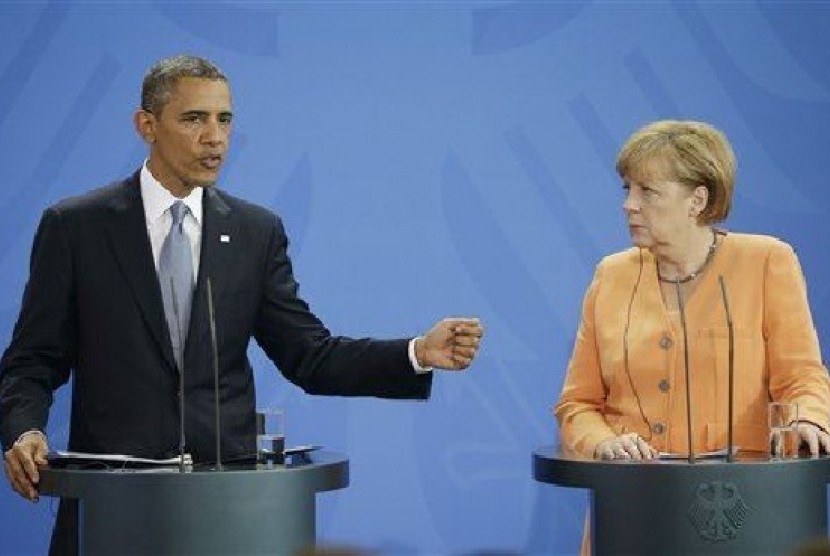 Presiden AS Barack Obama (kiri) dan Kaselir Jerman Angela Merkel dalam konferensi pers bersama di Berlin, Jerman, Rabu (