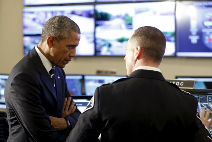 Presiden AS Barrack Obama (kiri).