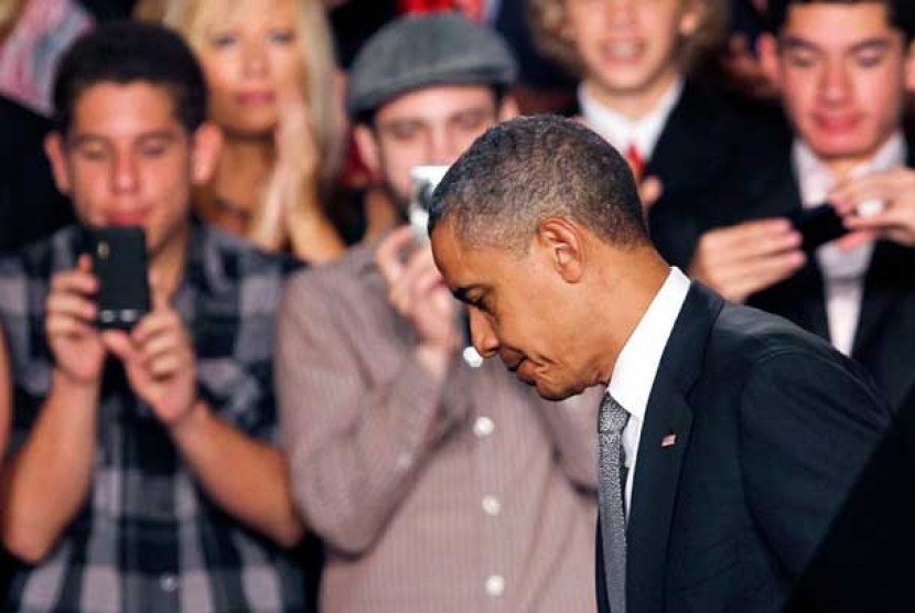 Presiden Barack Obama usai berpidato terkait penembakan di Colorado, AS.