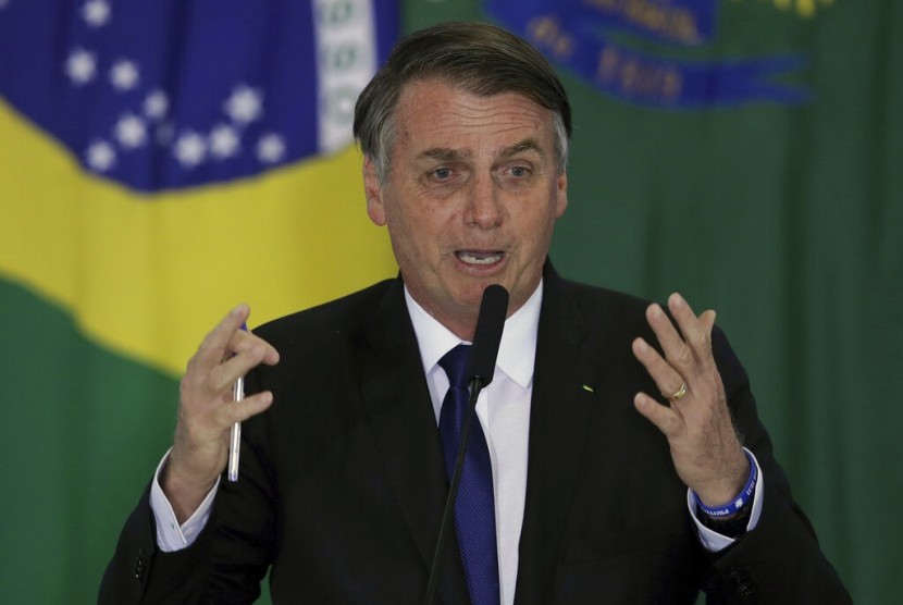 Presiden Brasil Jair Bolsonaro  menghadapi kritik atas reaksinya hadapi virus corona. Ilustrasi.