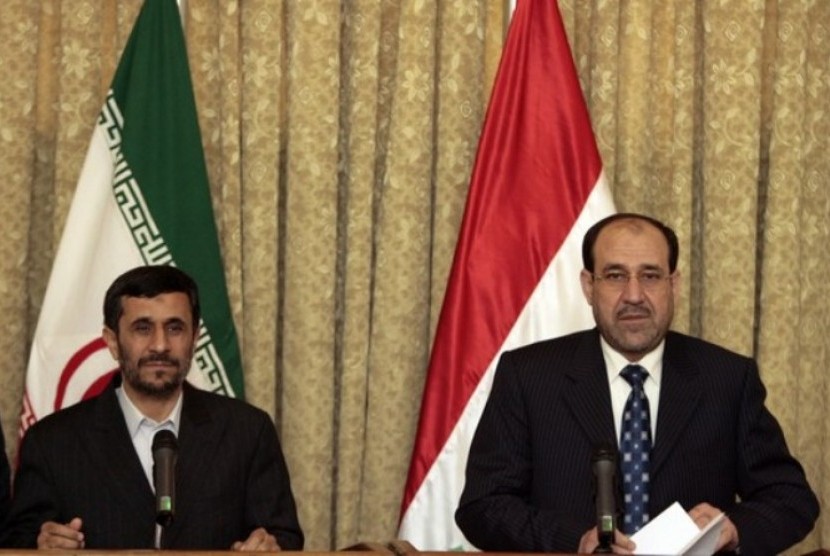 Presiden Iran Mahmoud Ahmadinejad dengan PM Irak Nouri Al-Maliki
