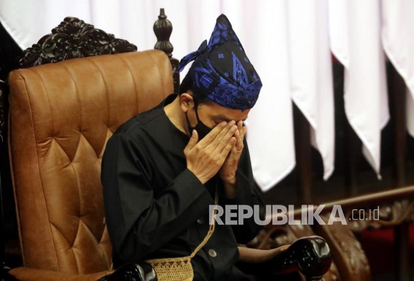 Presiden Joko Widodo berdoa saat mengikuti Sidang Tahunan MPR Tahun 2021 di Gedung Nusantara, Kompleks Parlemen, Senayan, Jakarta, Senin (16/8/2021). 