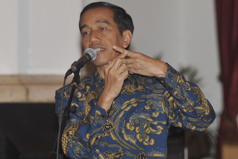 Presiden Joko Widodo menyampaikan pidato pada malam peringatan Hari Film Nasional di Istana Negara, Jakarta, Senin (30/3).
