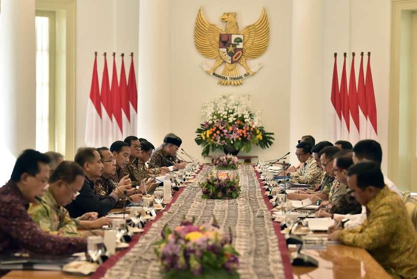 President Joko Widodo (central, left) chairs a limited meeting on Asian Para Games at Bogor Palace, West Java, Friday (Sept 7).