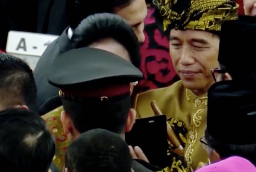 Presiden Jokowi usai melakukan pidato di Sidang Tahunan MPR 2019