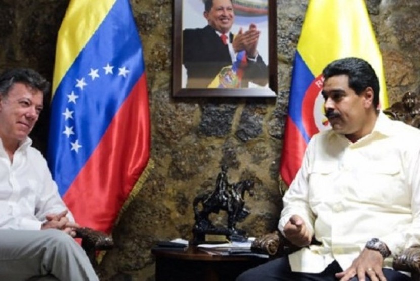 Presiden Kolombia Juan Manuel Santos dan Presiden Venezuela Nicolas Maduro.