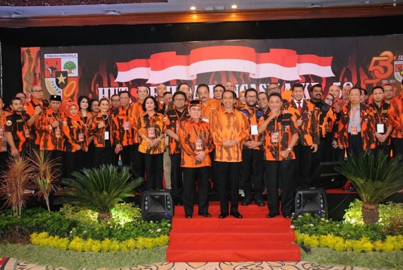 Presiden RI Joko Widodo dan Wakil Ketua MPR RI Oesman Sapta, Sabtu (28/10) menghadiri gelar acara HUT Pemuda Pancasila (PP) ke-58.