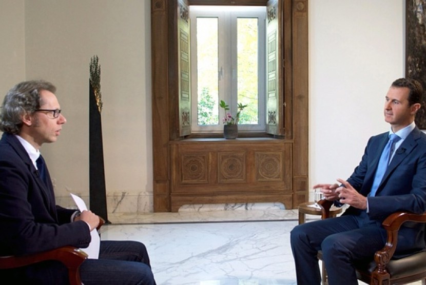 Presiden Suriah Bashar al-Assad saat wawancara dengan televisi Italia, Rai.