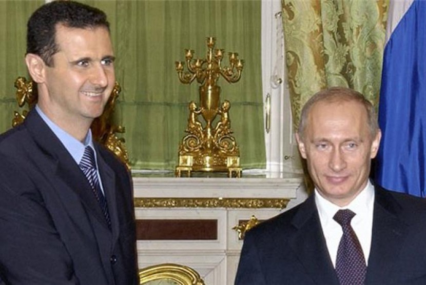 Presiden Suriah Bashar Assad dan Presiden Rusia Vladimir Putin.