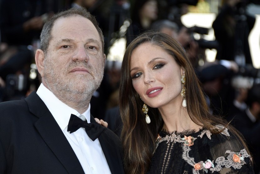 Produser asal Amerika Serikat Harvey Weinstein (kiri) dan istrinya, Georgina Chapman. Kasus pelecehan seksual membuat Champman memilih meninggalkan Weinsten. Weinsten, yang sudah dipecat dari The Weinstein Company, kini juga dikeluarkan dari keanggotaan Akademi Oscar. 