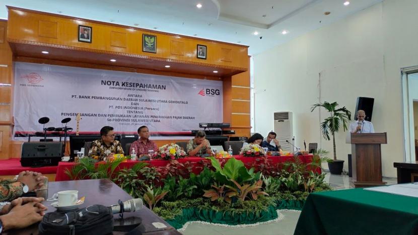 PT Pos Indonesia (Persero) menjalin kerja sama dengan PT Bank Pembangunan Daerah Sulawesi Utara dan Gorontalo (BSG) untuk meningkatkan penerimaan pajak daerah dan biller.