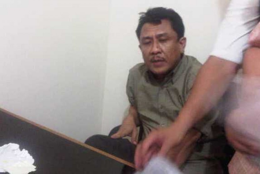 Puji Wijayanto, hakim yang tertangkap tangan pesta narkoba di sebuah tempat karaoke.