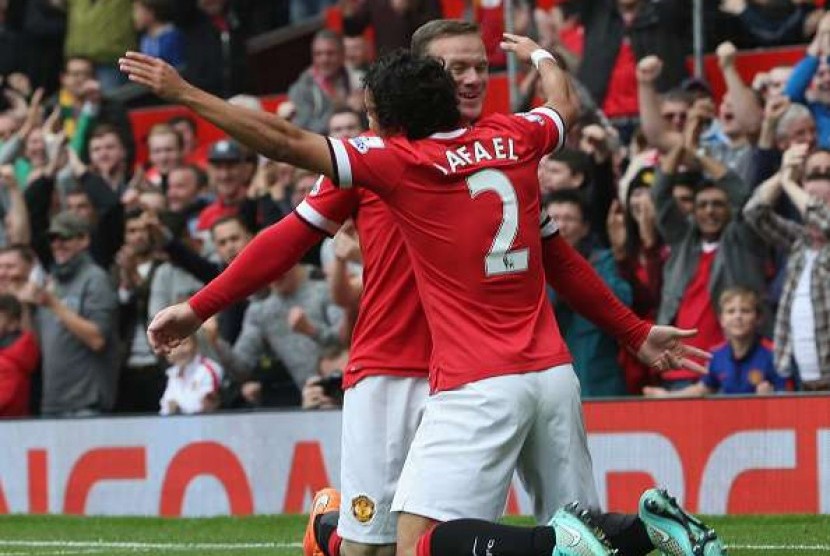 Rafael bersama Wayne Rooney