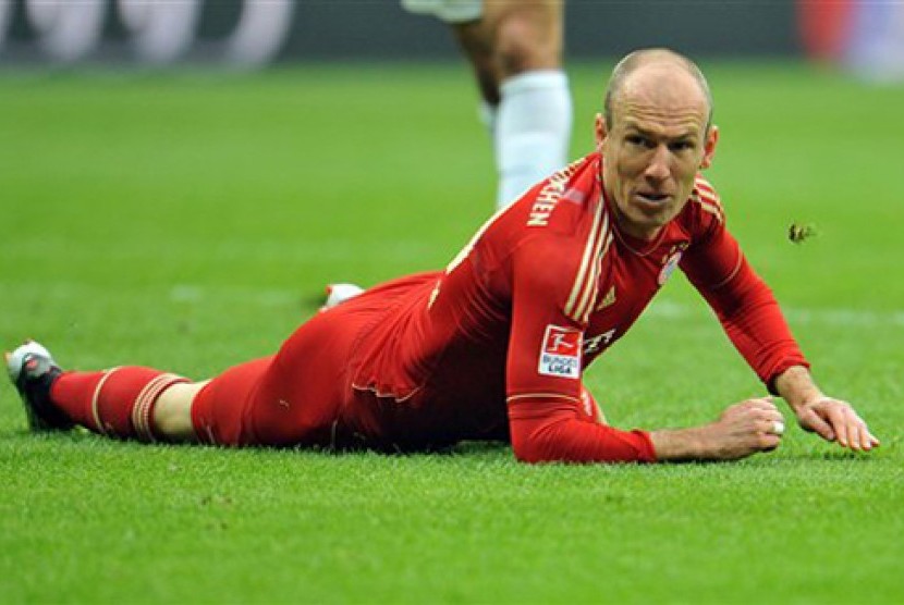  Reaksi Arjen Robben (Bayern Muenchen) saat bertanding melawan FSV Mainz 05 di Munich, Sabtu (14/4) waktu setempat. (AP Photo/Kerstin Joensson)