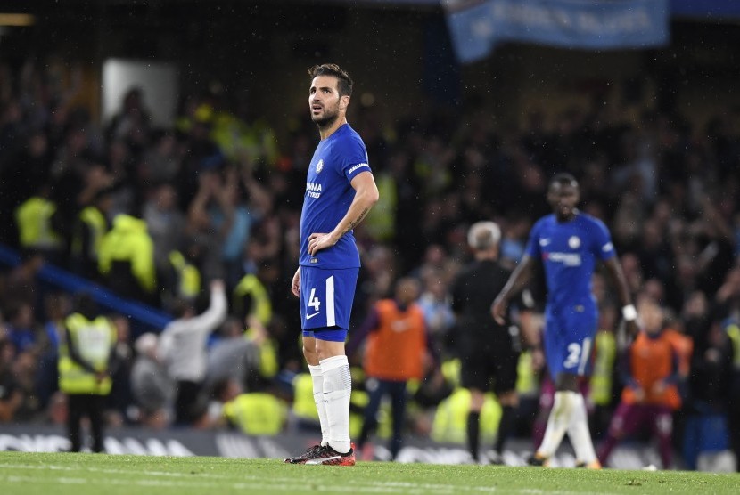 Reaksi Cesc Fabregas ketika Chelsea kalah dari Manchester City pada Sabtu (30/9).