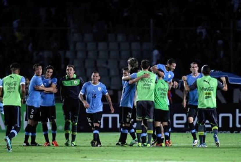 Reaksi para pemain Uruguay setelah timnya mengalahkan Venezuela di partai kualifikasi Piala Dunia zona Conmebol di Puerto Ordaz, Rabu (12/6).