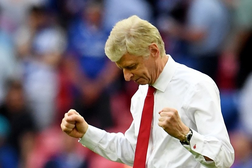 Reaksi pelatih Arsenal, Arsene Wenger setelah timnya berhasil mengalahkan Chelsea pada final Piala FA di Wembley, London, Ahad (27/5) dini hari WIB.