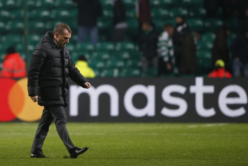 Reaksi pelatih Glasgow Celtic, Brendan Rodgers pada laga Liga Champions lawan Barcelona di Celtic Park, Kamis (24/11) dini hari WIB. Celtic kalah 0-2.