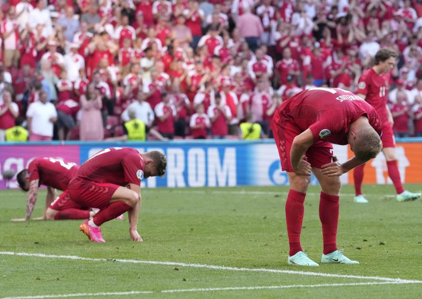  Reaksi pemain Denmark setelah kalah dalam pertandingan sepak bola babak penyisihan grup B UEFA EURO 2020 antara Denmark dan Belgia di Kopenhagen, Denmark, 17 Juni 2021.