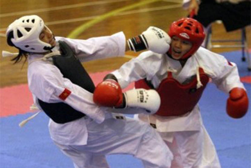 Riny Imelda Samol saat berlaga melawan atlet Vietnam