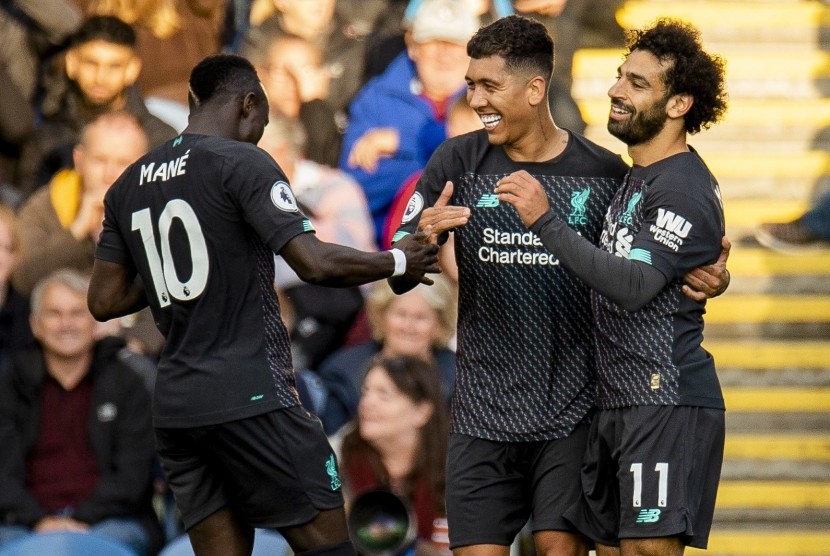 Sadio Mane (Kiri), Roberto Firmino dan Mohamed Salah (Kanan) 