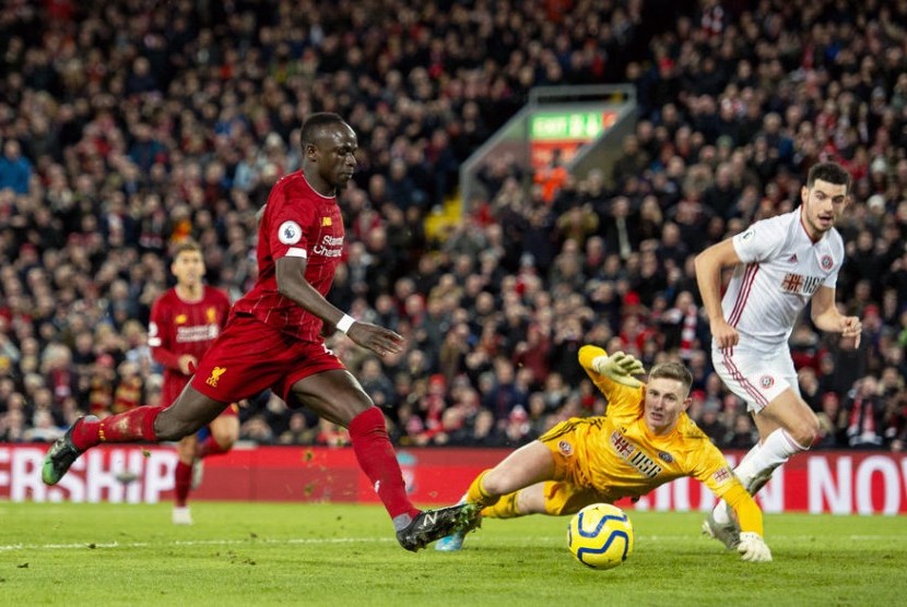 Sadio Mane mencetak gol kedua Liverpool ke gawang Sheffield United.