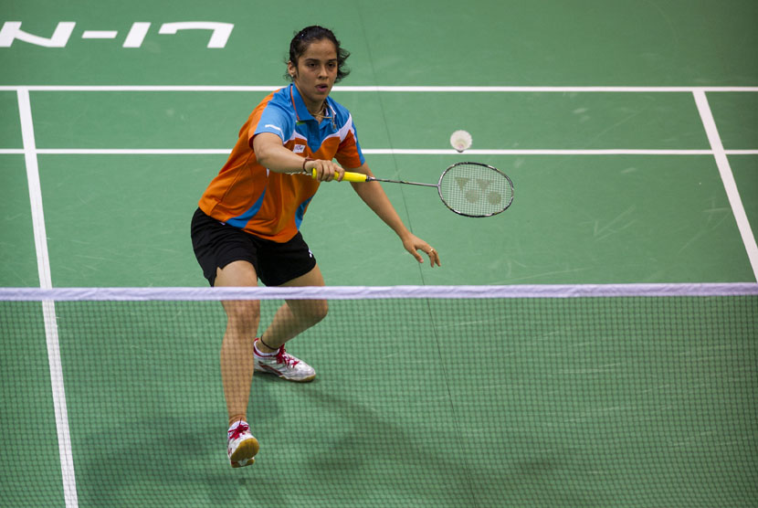 Saina Nehwal beraksi pada pertandingan Piala Uber 2014 di Siri Fort Sports Complex, New Delhi, India.