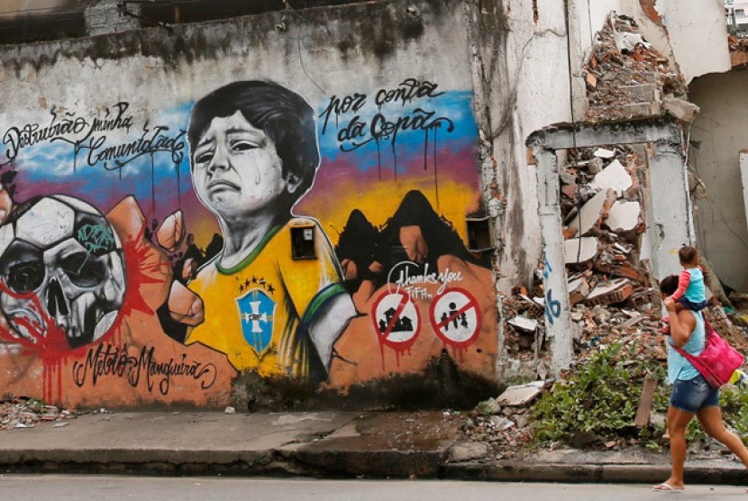 Salah satu seni grafiti yang menggambarkan kemarahan warga Brasil terhadap Piala Dunia 2014.